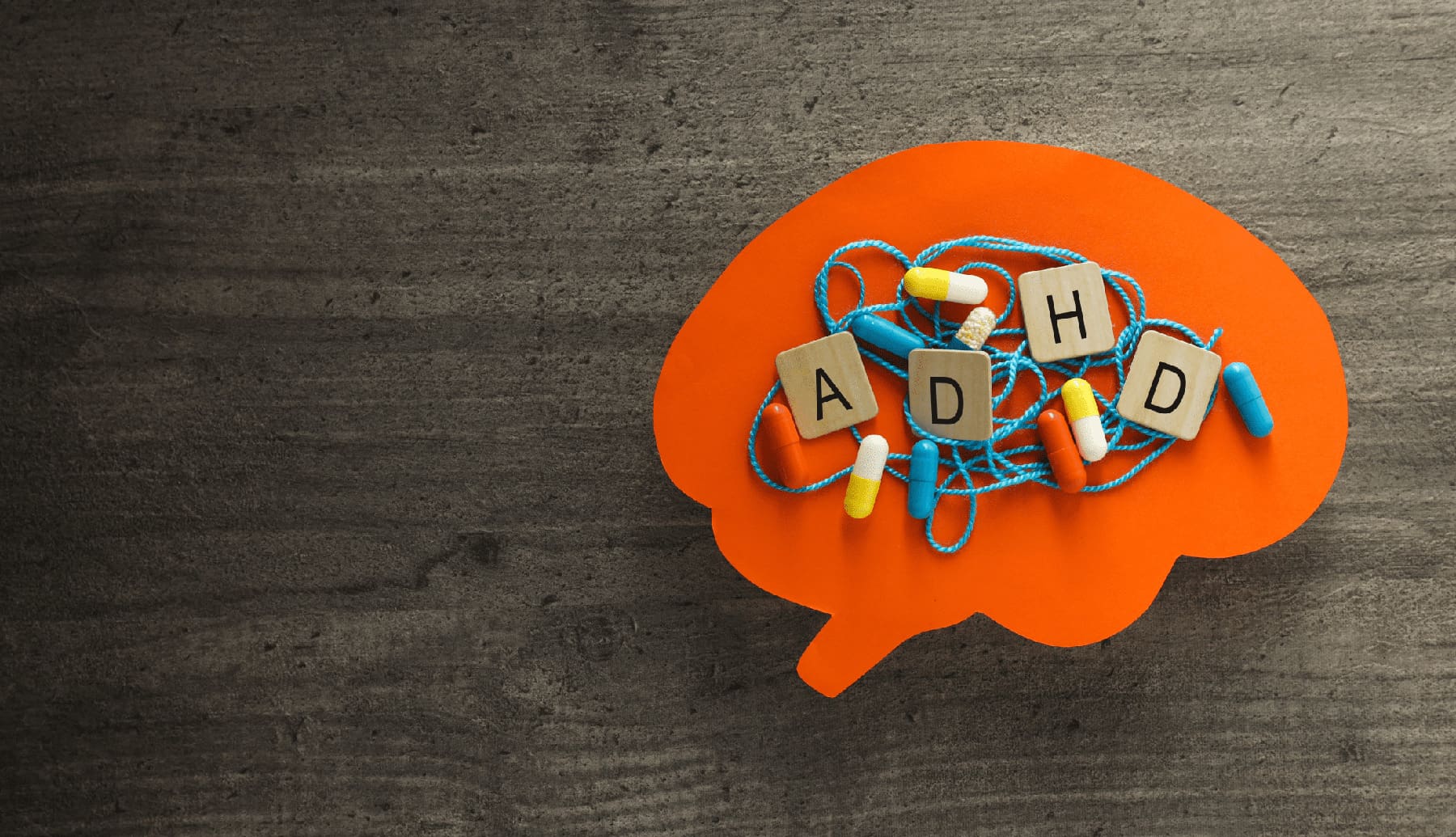 Paper brains with tangled thread, pills and letters with space for text